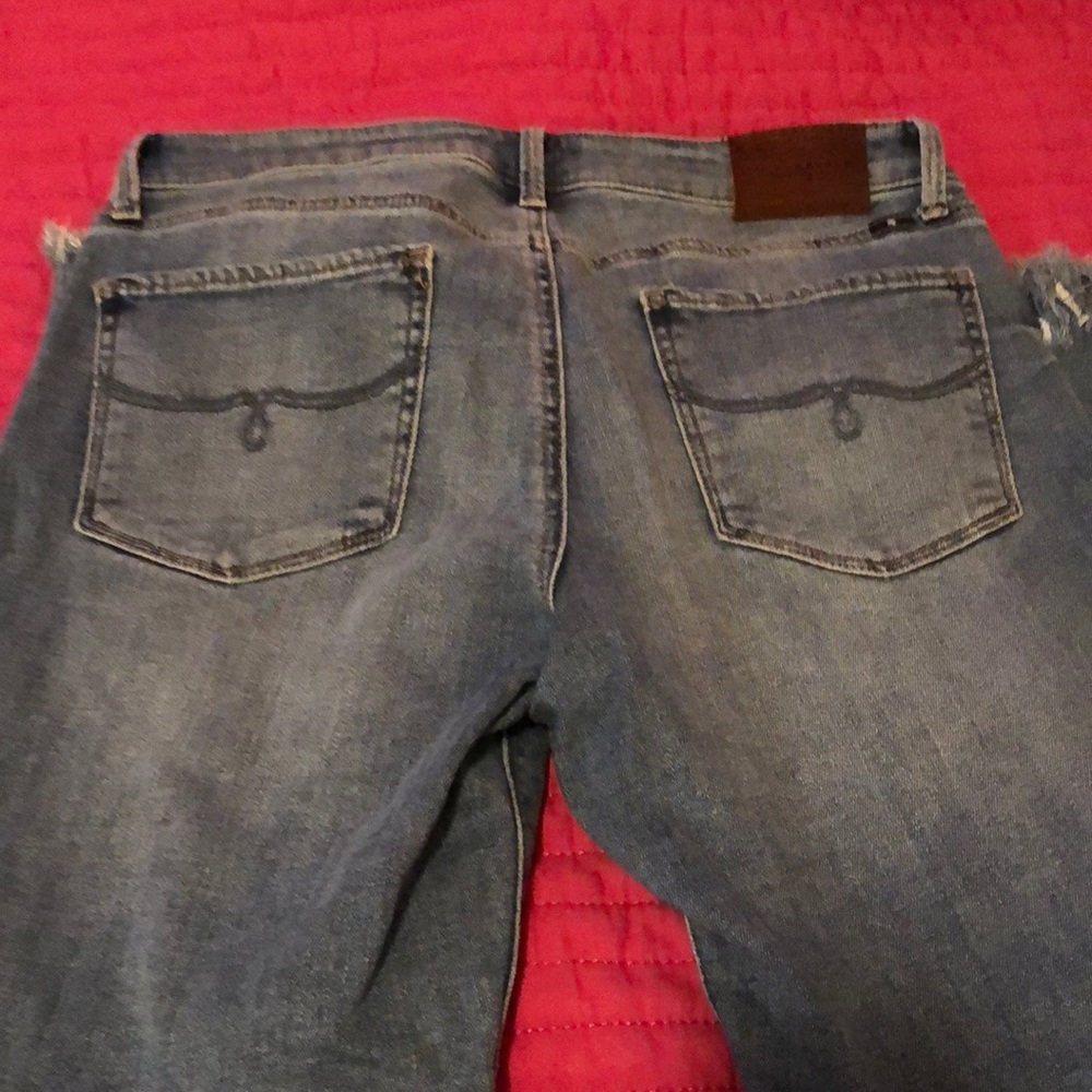 Lolita Mid Rise Skinny Jean with Fringed Hem!